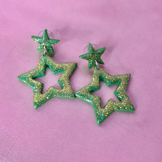 Handmade glittery star clay earrings