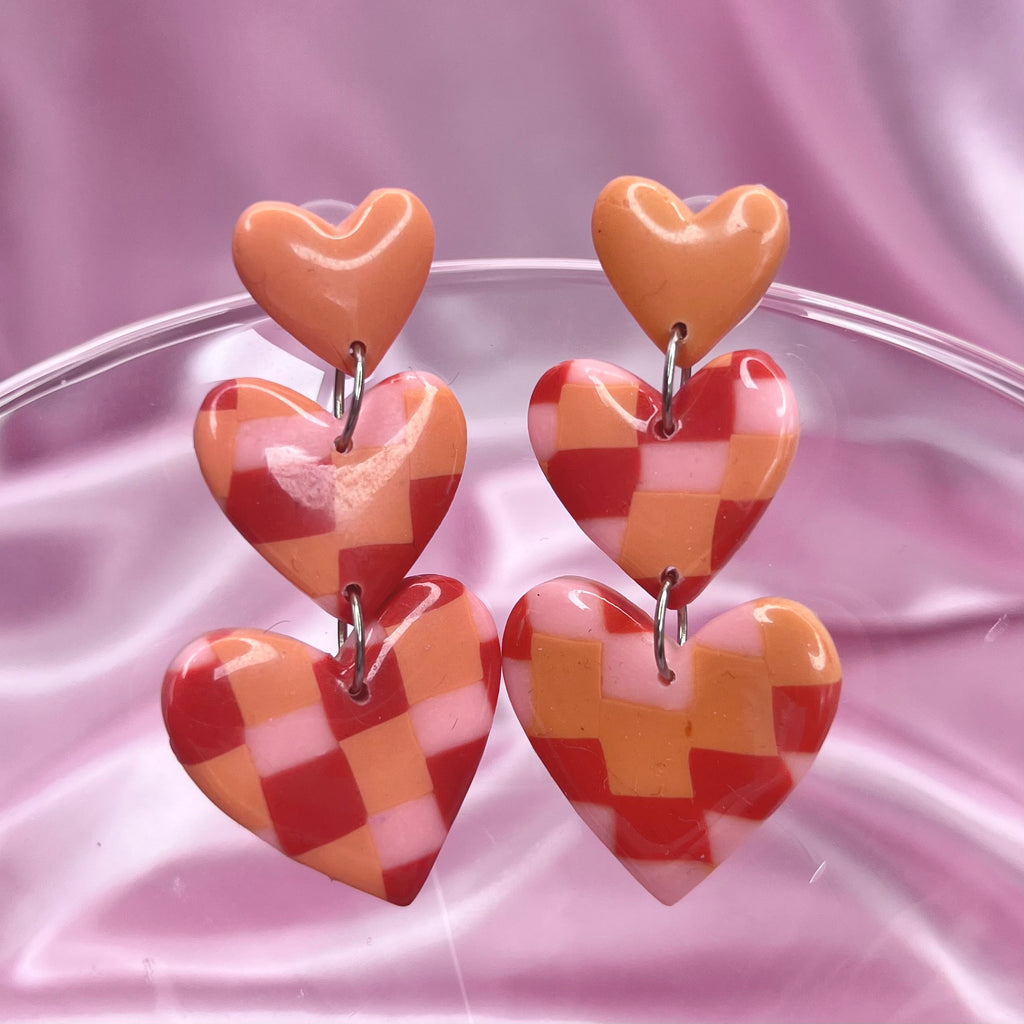 Handmade tiered heart clay earrings