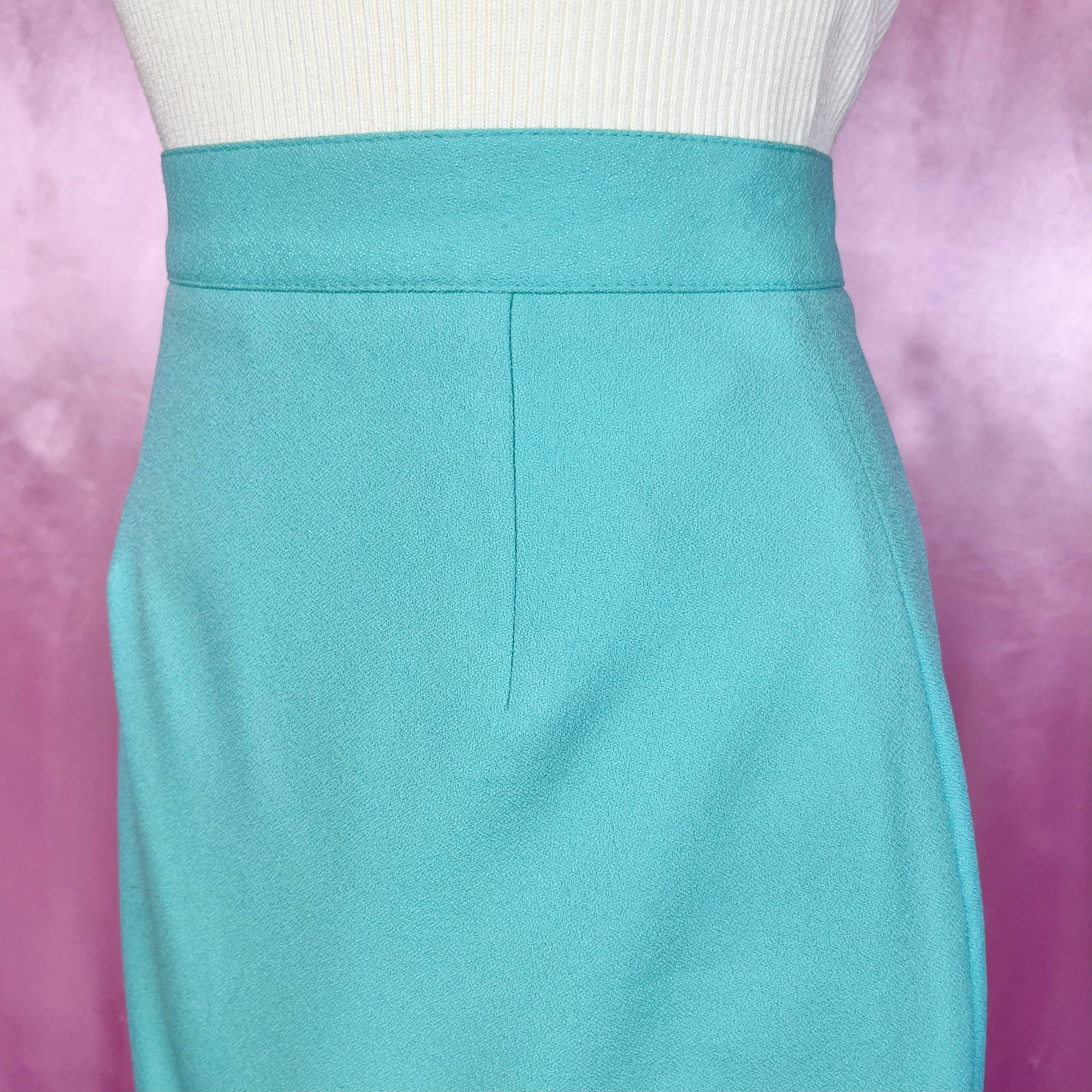 1990s Turquoise mini skirt, by Kit, size 8