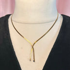 15.5” Gold toned lariat style necklace