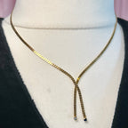 15.5” Gold toned lariat style necklace