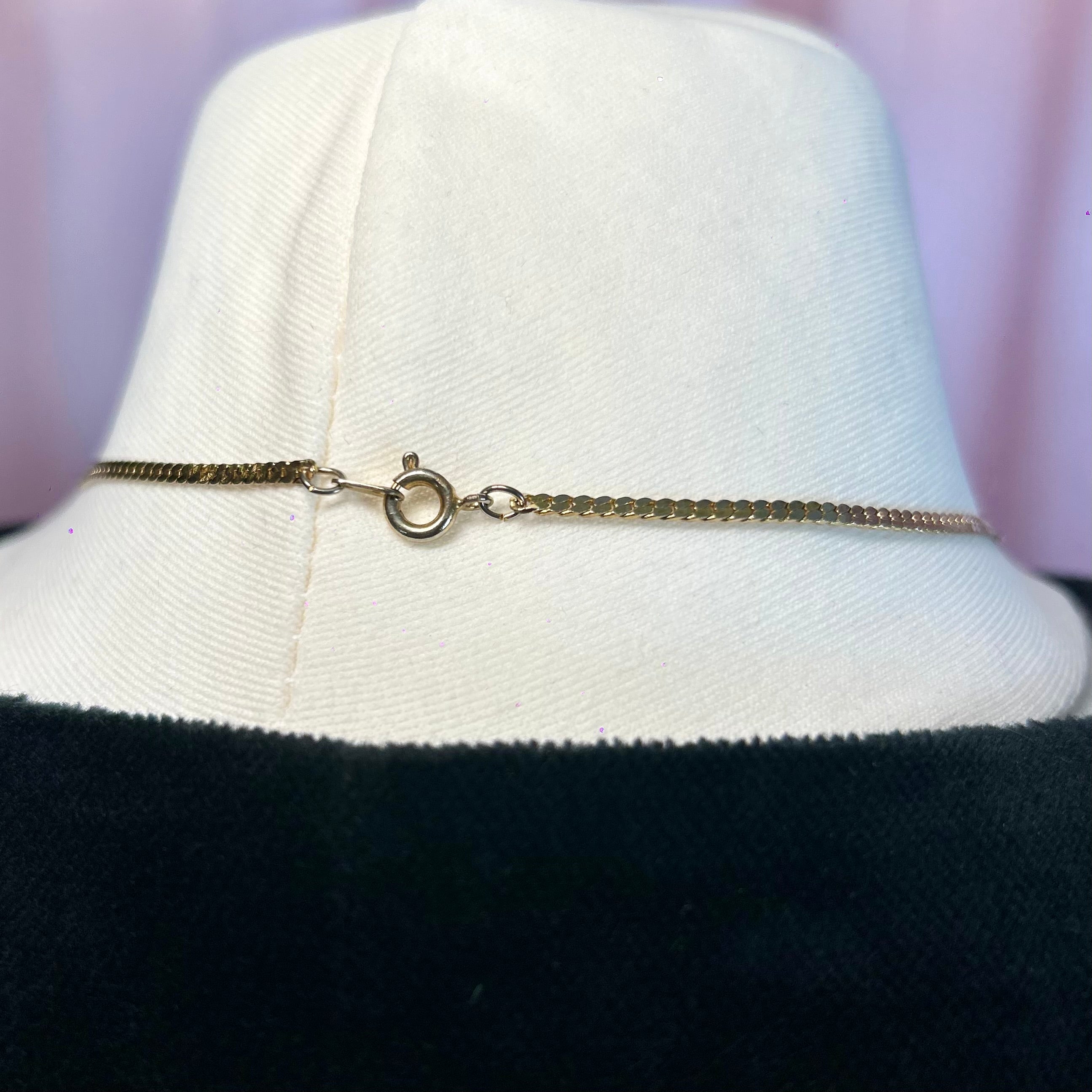 15.5” Gold toned lariat style necklace