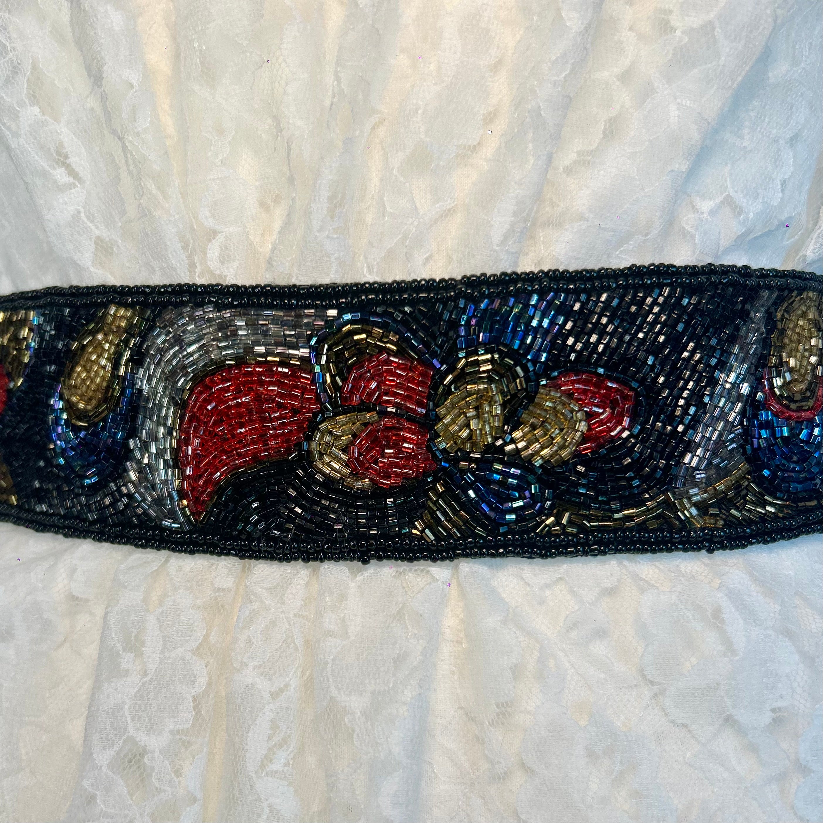 1980s swirling beaded belt, size 10/12