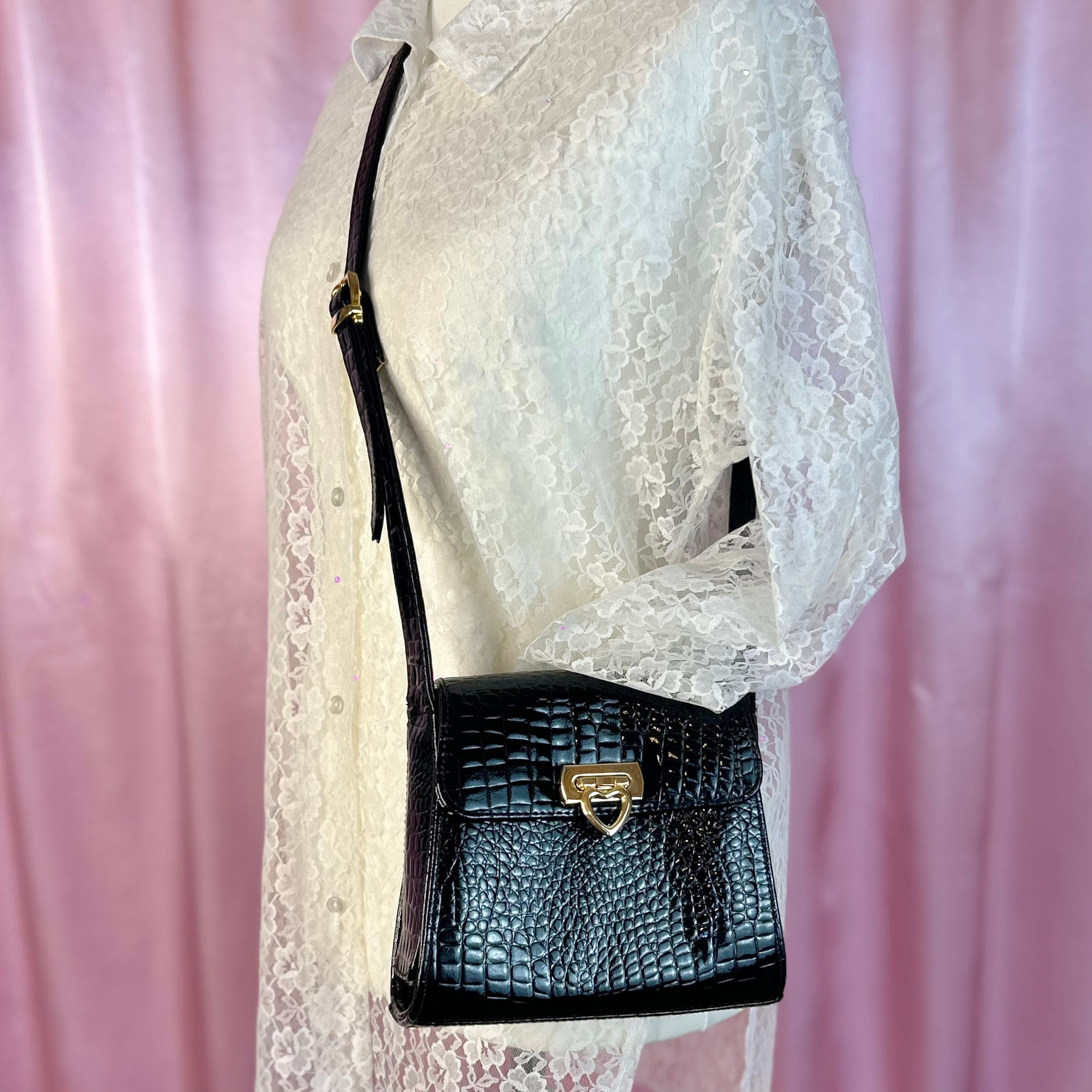 1990s Black patent heart clasp bag