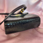 1990s Black patent heart clasp bag