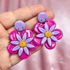 Handmade purple daisy clay earrings