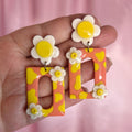 Handmade daisy cow print earrings