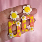Handmade daisy cow print earrings
