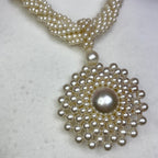 Statement pearl effect medallion necklace