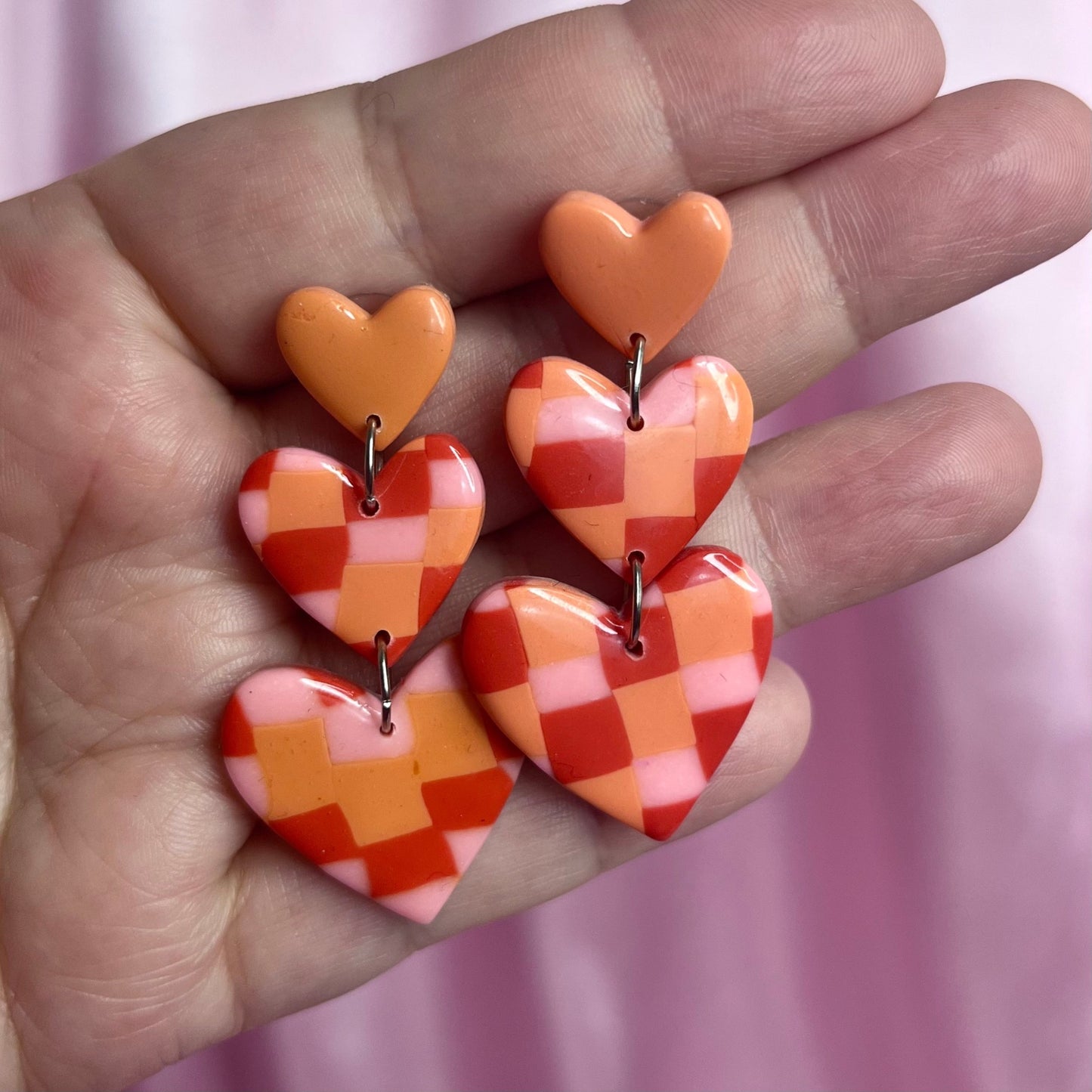 Handmade tiered heart clay earrings