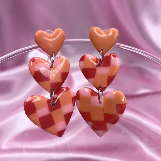 Handmade tiered heart clay earrings
